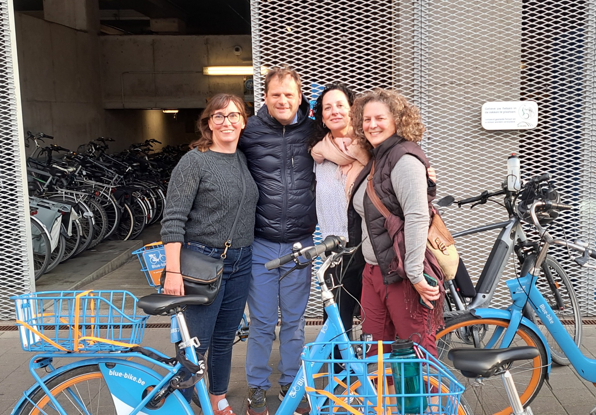 Guide welcoming guests at the railway station for a bike tour